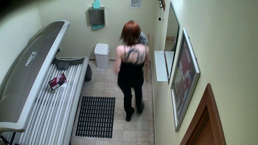 Tattooed redhead getting a tan |  
	307 
